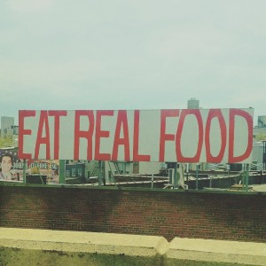 Just eat real food. Best nutrition advice from a handmade billboard ever. #Queens #NYC #photography #nutrition